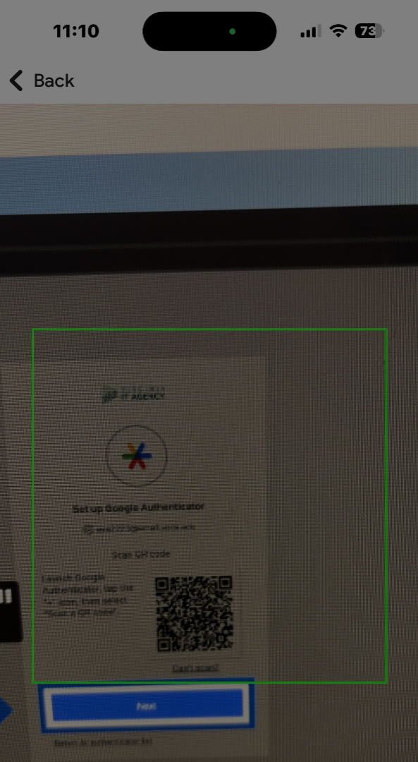 Screenshot showing phone camera scanning QR code on computer screen